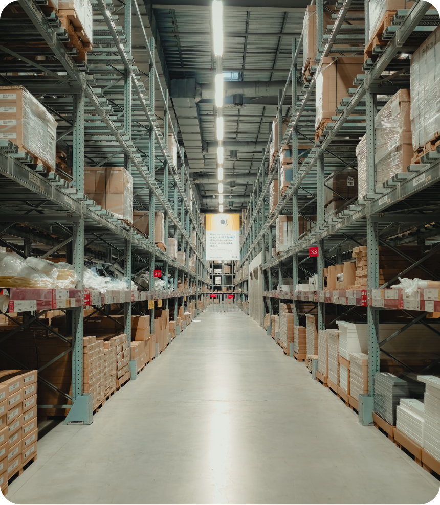 A stocked, climate-controlled warehouse aisle lined with storage racks