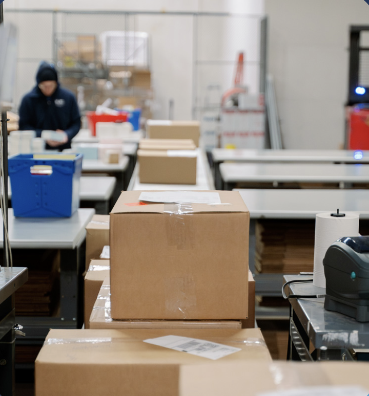 Warehouse staff preparing supply orders